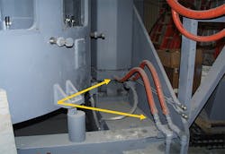 Figure 3. Each day, check for hydraulic fluid leaks. Figure 3. Each day, check for hydraulic fluid leaks.