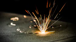 Metal is sintered under the action of a laser into a designed shape.