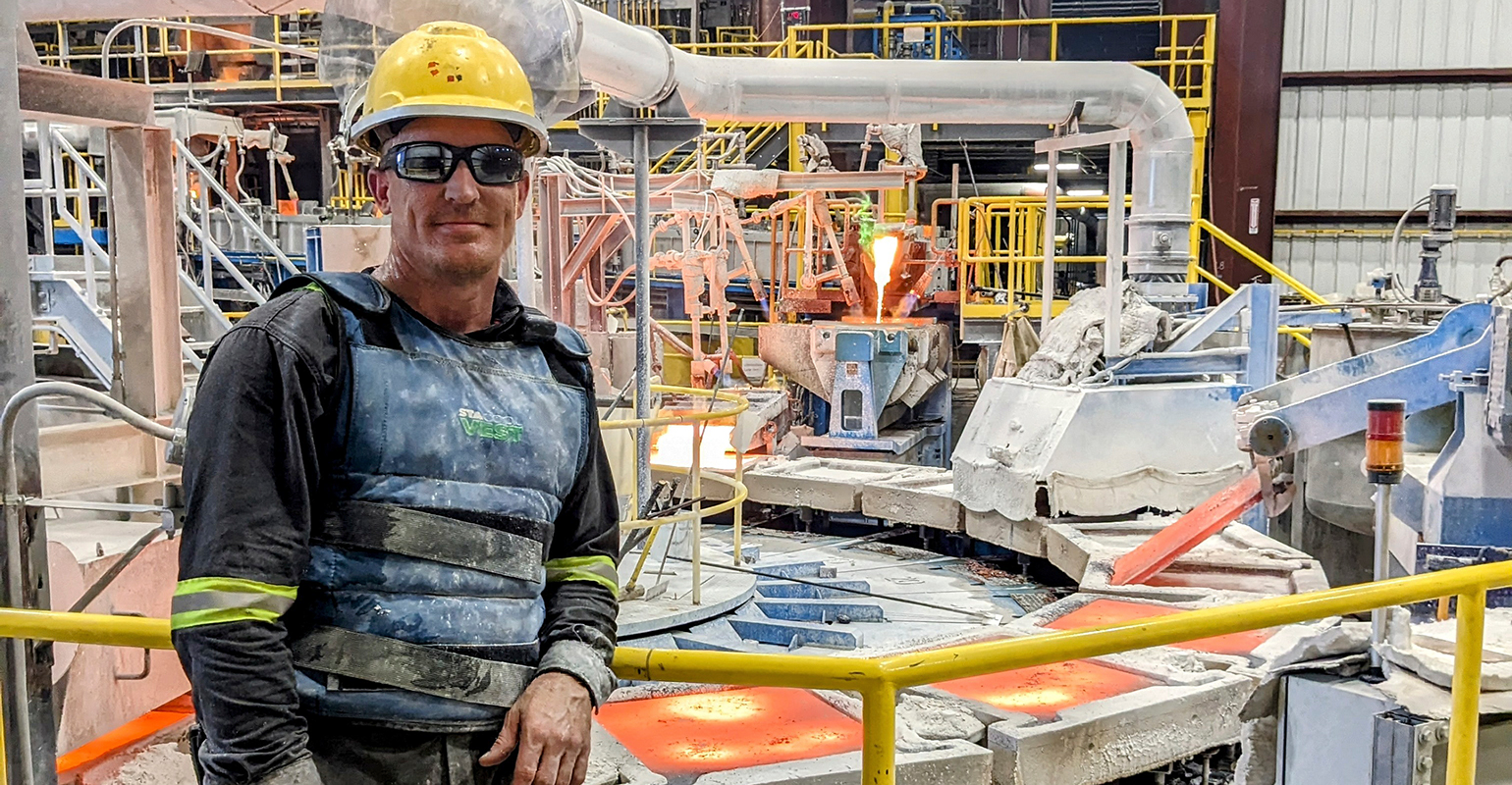 Workers wear the StaCool vest under aluminized PPE, with frozen thermal packets inserted into pockets to help regulate core body temperatures.