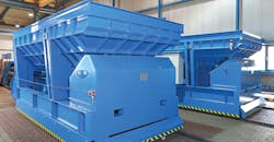 The Cyrus Equipment mobile charger delivers scrap materials for electric induction melting, with a charging capacity of 40-70 tph, operating at a drive speed of approximately 18 cm/second. The Cyrus Equipment mobile charger delivers scrap materials for electric induction melting, with a charging capacity of 40-70 tph, operating at a drive speed of approximately 18 cm/second.