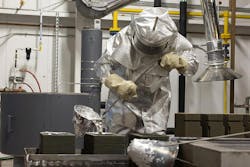 Ted Fetchik, a USAF 553rd Commodities Maintenance Squadron welder, pours aluminum into a 3D-printed mold at Tinker Air Force Base. Ted Fetchik, a USAF 553rd Commodities Maintenance Squadron welder, pours aluminum into a 3D-printed mold at Tinker Air Force Base.