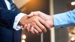Businessmen shaking hands, close-up. Businessmen shaking hands, close-up.