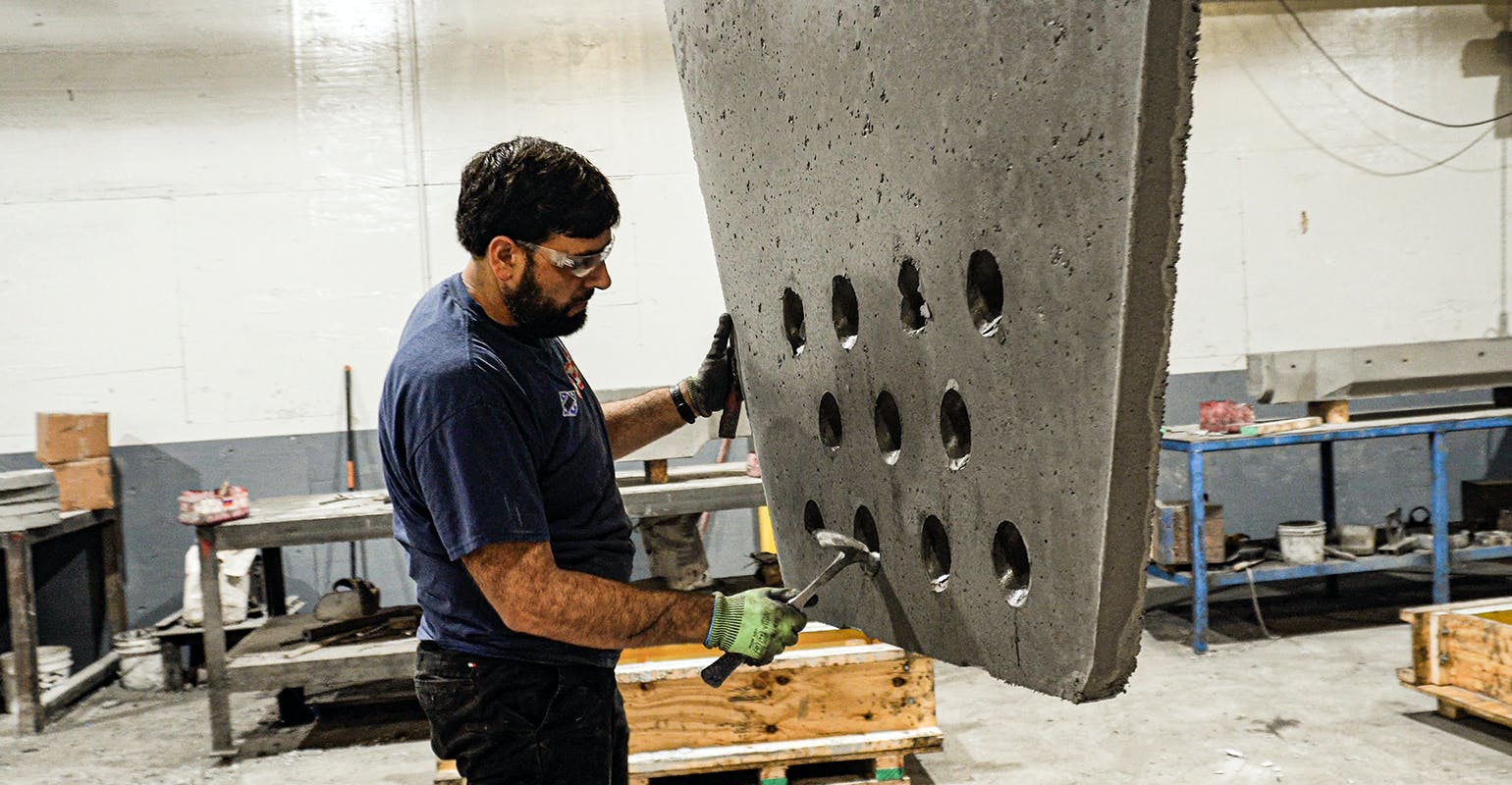Stripping a precast shape from its mold.