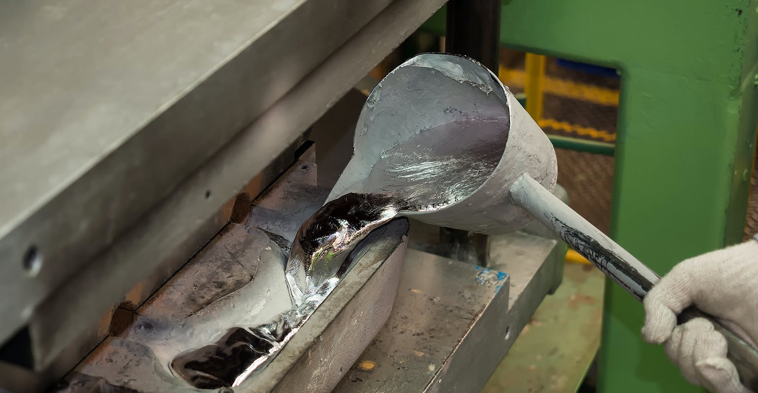 Pouring molten aluminum into a diecasting launder. Oxidation is diminishing the useful value of the alloy whenever the metal is exposed to the atmosphere. Pouring molten aluminum into a diecasting launder. Oxidation is diminishing the useful value of the alloy whenever the metal is exposed to the atmosphere.