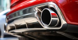 Exhaust pipes emitting subtle fumes. Exhaust pipes emitting subtle fumes.