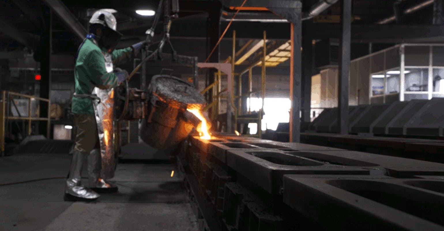 Filling a green sand mold at Pier Foundry, St. Paul, MN.