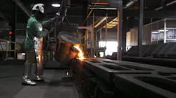 Filling a green sand mold at Pier Foundry, St. Paul, MN.