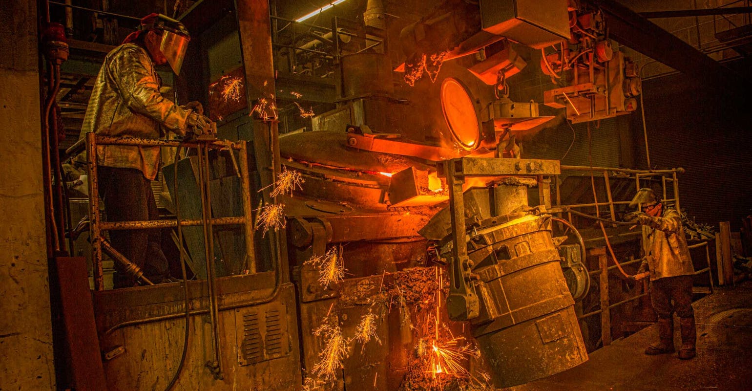 Molten metal transfer using crucibles at Smith Foundry, Minneapolis.