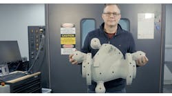 Astech engineering manager Bob Helwer holds a pattern printed on the company’s EXT Titan Pellet 3D printer. Astech engineering manager Bob Helwer holds a pattern printed on the company’s EXT Titan Pellet 3D printer.