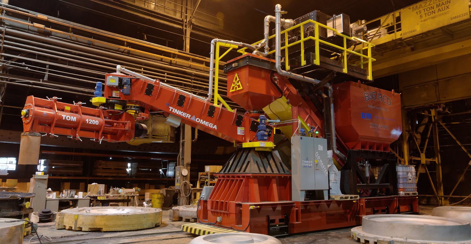 Tinker Omega sand mixing machine.