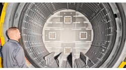 Adam Jones, Midwest regional sales manager at Solar Manufacturing, examines the 48x48x72-inch deep insulated hot zone of a new vacuum furnace at FPM Heat Treating. Adam Jones, Midwest regional sales manager at Solar Manufacturing, examines the 48x48x72-inch deep insulated hot zone of a new vacuum furnace at FPM Heat Treating.