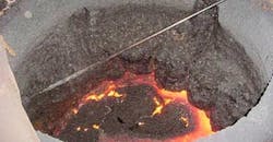 Severe slag build-up in the upper case of a channel furnace. Severe slag build-up in the upper case of a channel furnace.
