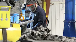 Grinding castings at Waupaca Foundry, Ironwood, MI.