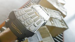 Worker operating barcode scanner. Worker operating barcode scanner.