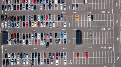 Aerial view of cars parked in a lot.