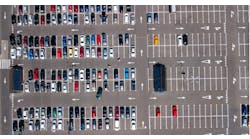 Aerial view of cars parked in a lot. Aerial view of cars parked in a lot.
