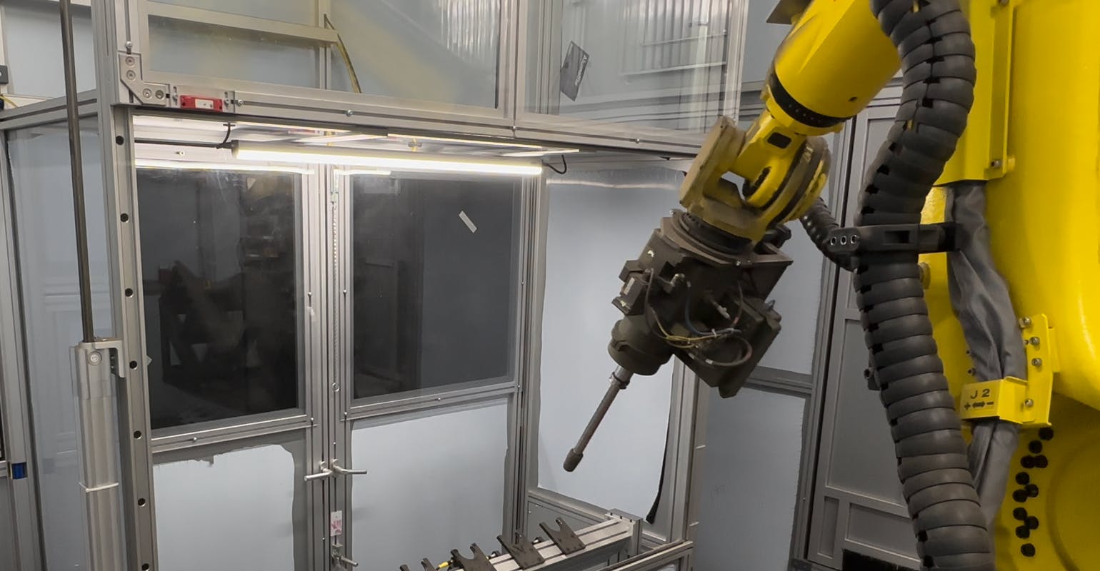 Weiler Abrasives automated grinding cell.