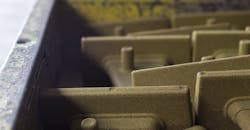 Resin-coated sand cores. Resin-coated sand cores.