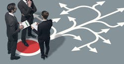 Team planning strategies for their business, pondering direction and making decisions together. Team planning strategies for their business, pondering direction and making decisions together.