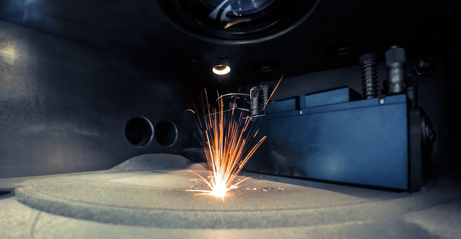 Metal additive manufacturing, laser printing in powdered metal bed.