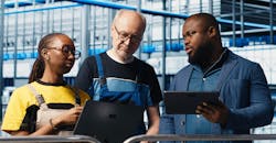 Manager overseeing smart factory Manager overseeing smart factory