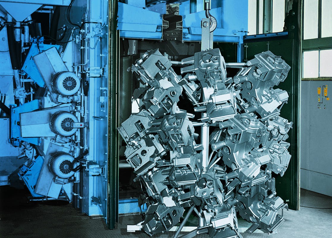 Wheelabrator spinner-hanger machine