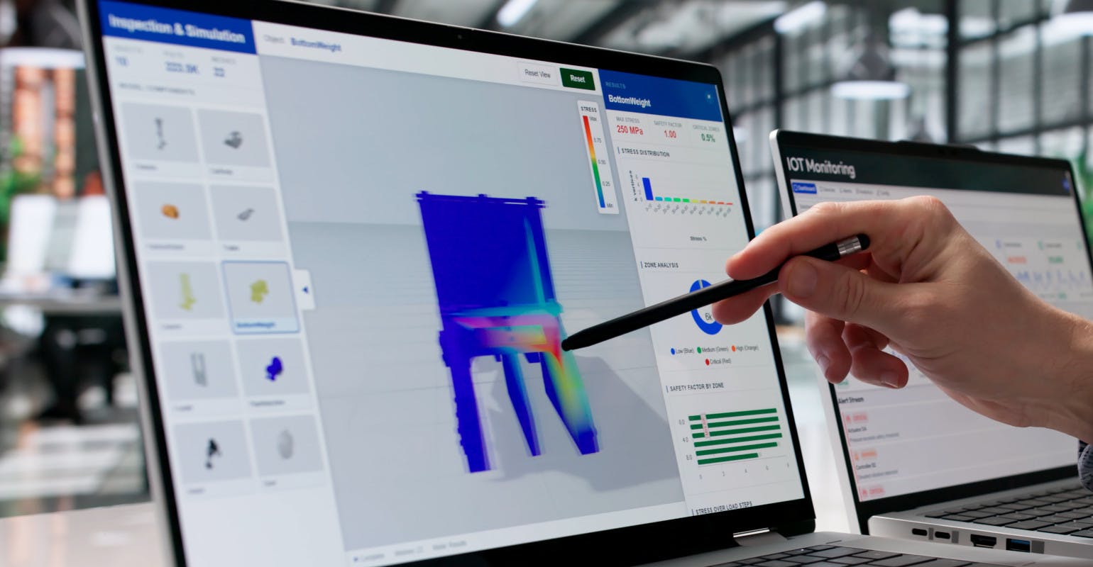 Engineer uses FEA to review design.