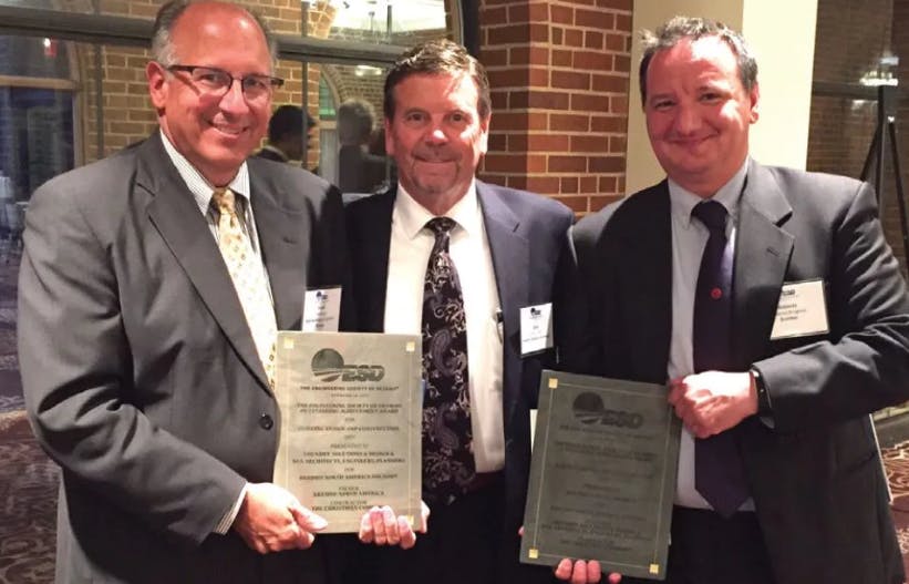 Lary Ernst, vice president of Foundry Solutions & Design, flanked by two of that firm's partners in the development of Brembo North America's Homer, MI, gray iron foundry