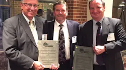 Lary Ernst, vice president of Foundry Solutions & Design, flanked by two of that firm's partners in the development of Brembo North America's Homer, MI, gray iron foundry