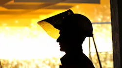 Iron casting plant worker.