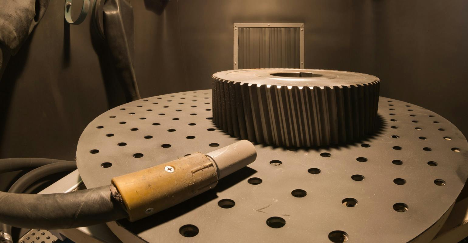 Interior, shot-blasting machine.
